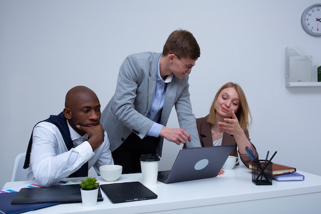 three people in suits